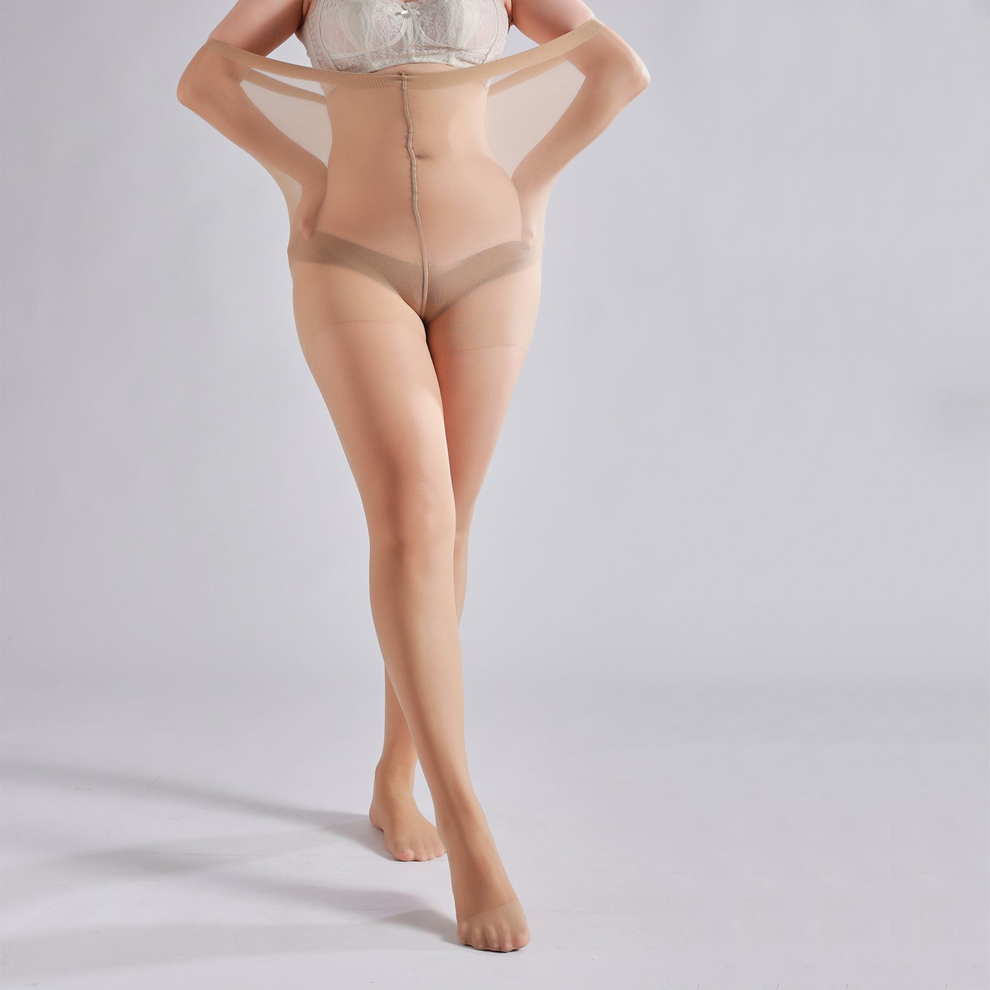 Woman wearing 20D sheer pantyhose with open toe design and high waist.